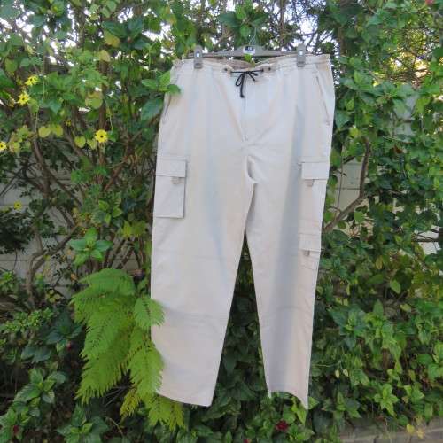 Comfy beige Men's pants. Size large by J, EXCHANGE Edgars .Pockets galore. Drawstring waist. As new