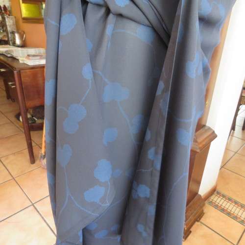 Stunning sleek maxi dress in 2 layers. Sleeveless with round neckline size 36/12. As new.