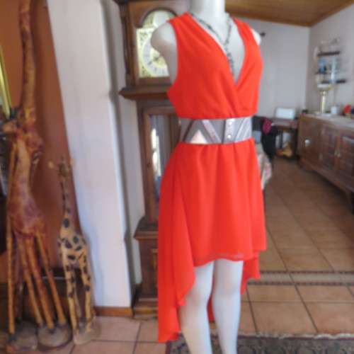 Sexy bright red sheer polyester dress with lining. Mini length on front size 38/14. Good condition.