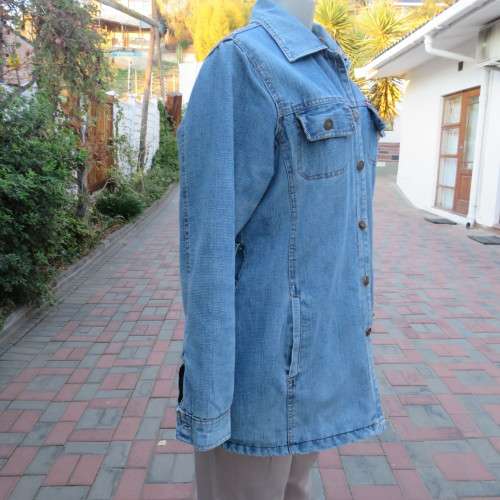 Stunning blue padded denim jacket in size 36/12 by RAOGUE.4 pockets on front. Button down.Good cond