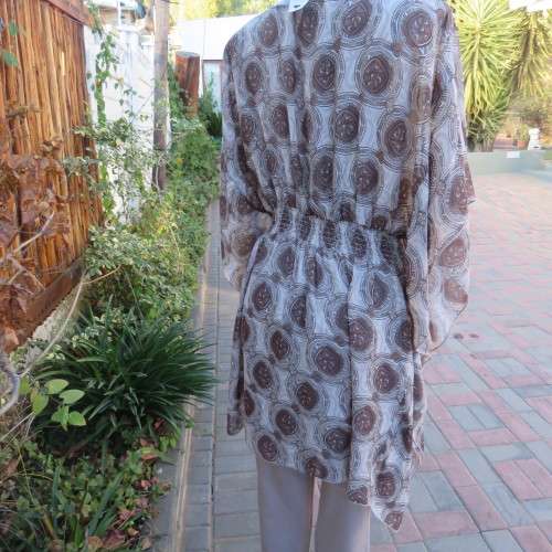 High quality GINGER MARY long polyester top with elasticated waist. Size 44/20. As new
