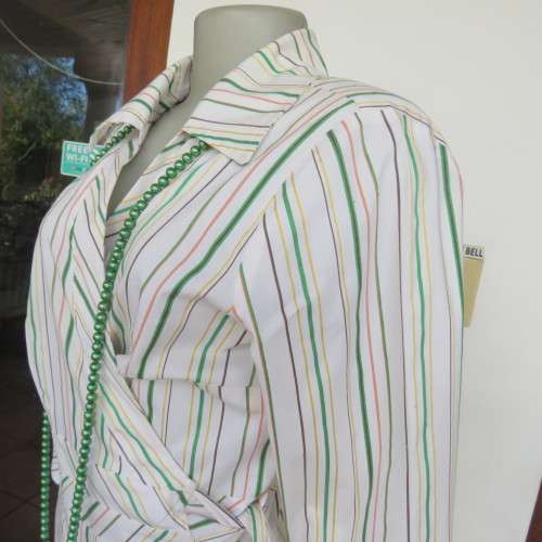 Smart embossed striped cross over top. Size 38/14 by INWEAR Long cuffed sleeves. New condition.