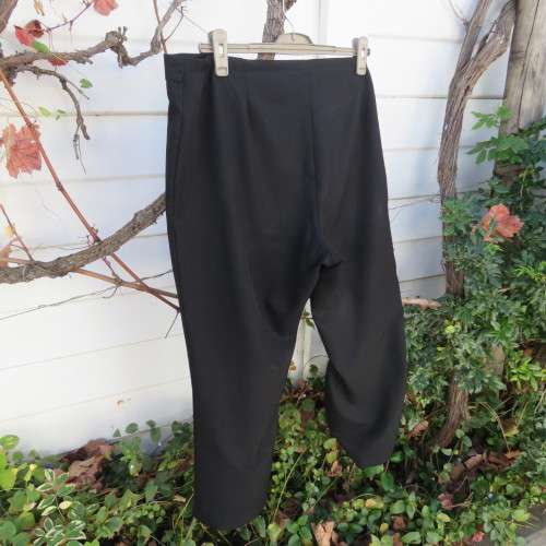 Smart black 100% polyester pants by 'Donna- Claire' in size 46/22. Straight legs. As new.
