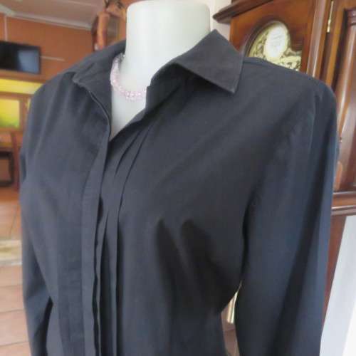 Timeless black long sleeve shirt by 'Woolworths' in size 38/14. Cuffed sleeves. In 100% cotton.