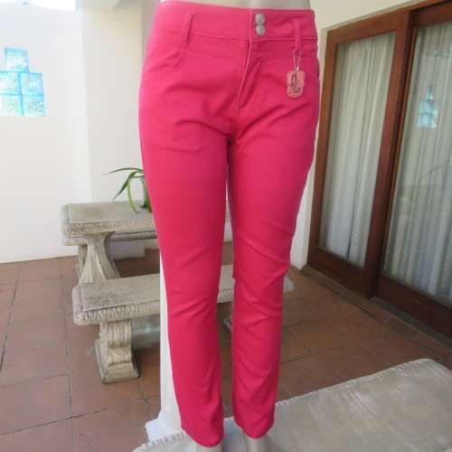 Go all magenta pink skinny pants. Size 36/12 y 'RT'. New condition. Used once.