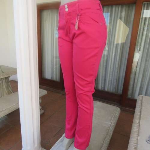 Go all magenta pink skinny pants. Size 36/12 y 'RT'. New condition. Used once.