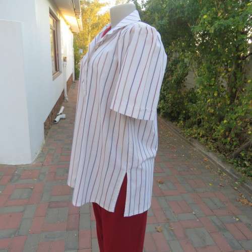 Casual short sleeve owner made shirt in white with red + blue stripes size 42/18. New condition.
