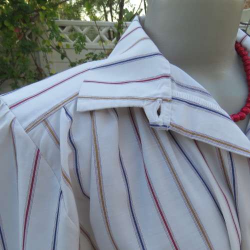 Casual short sleeve owner made shirt in white with red + blue stripes size 42/18. New condition.