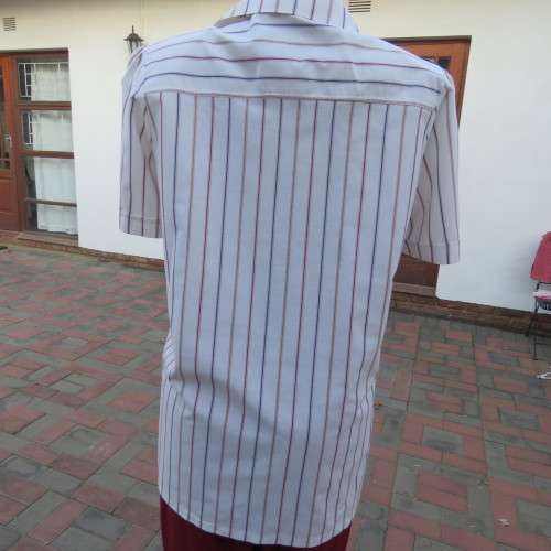 Casual short sleeve owner made shirt in white with red + blue stripes size 42/18. New condition.