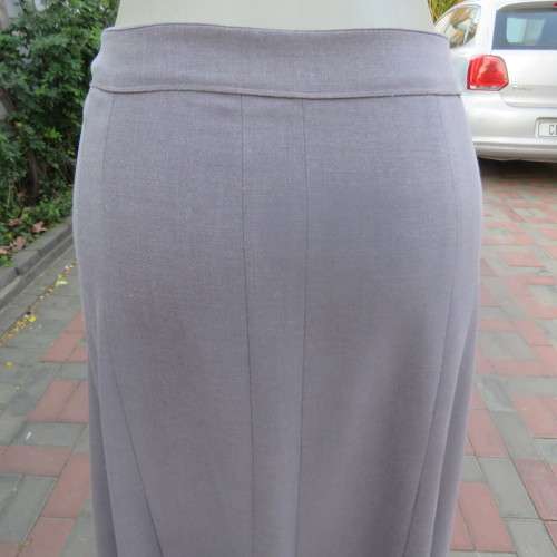 Elegant paneled A line skirt in ecru  with silver  thread embroidery on front. Size 42/18. As new