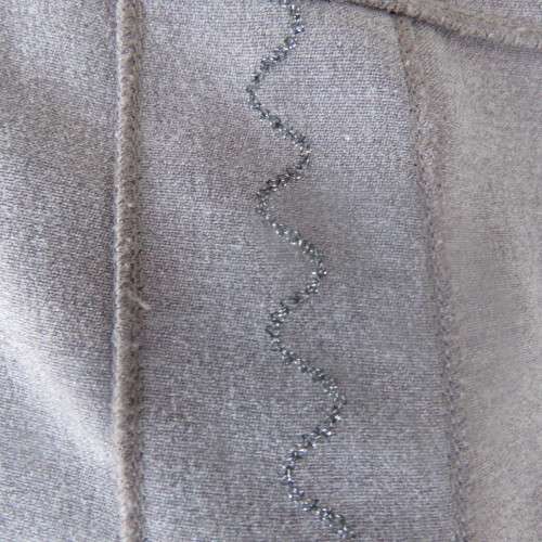 Elegant paneled A line skirt in ecru  with silver  thread embroidery on front. Size 42/18. As new