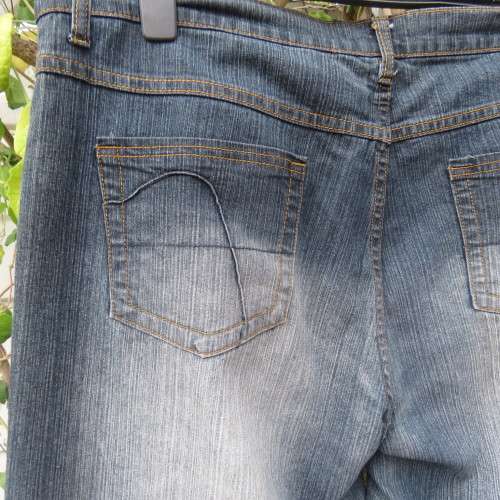 Fashion blue denim jeans in size 42/18.In stretch polyester fabric. Straight legs. As new.