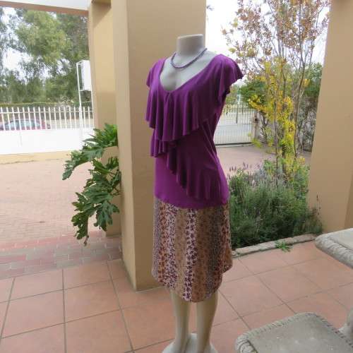 Seriously sexy sleeveless top in voilet 100% stretch viscose size 36/12 by 'WOOLWORTHS'.