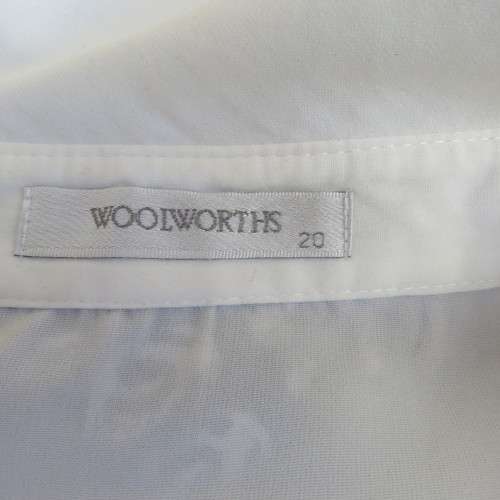 Sophisticated soft cream long sleeve top by 'WOOLWORTHS' in size 44/20. New condition. Used once.