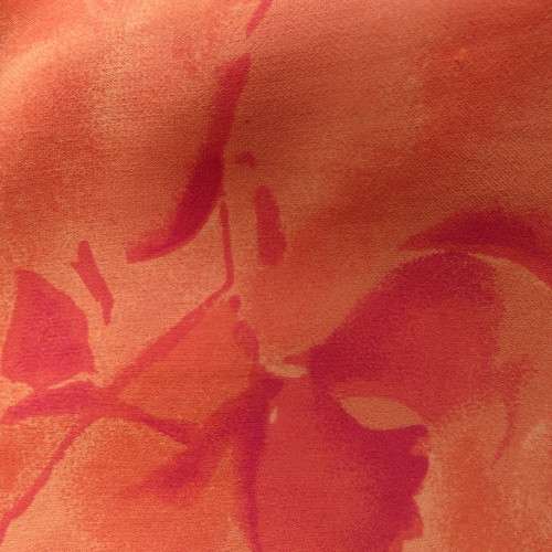 Eyecatching orange floral bodycon skirt in sheer viscose with lining. Size 32/8 by TOPICS.As new