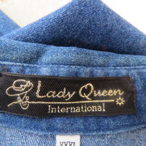 Sassy blue denim button down top with shirt collar and dainty white seam embroidery. Size 46 to 48