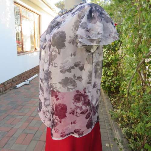 Sweet silver grey sheer polyester summer top with darker grey flowers. Size 36/12 by FASHION EXPRESS