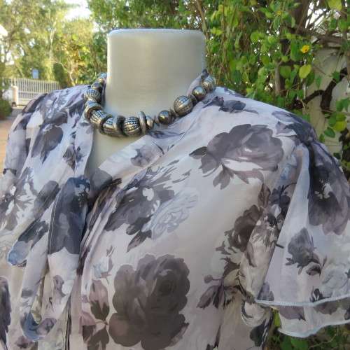 Sweet silver grey sheer polyester summer top with darker grey flowers. Size 36/12 by FASHION EXPRESS
