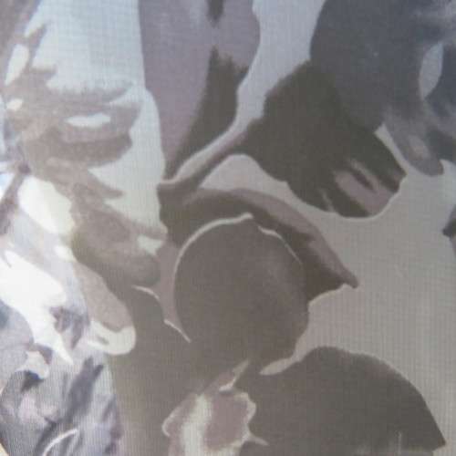 Sweet silver grey sheer polyester summer top with darker grey flowers. Size 36/12 by FASHION EXPRESS