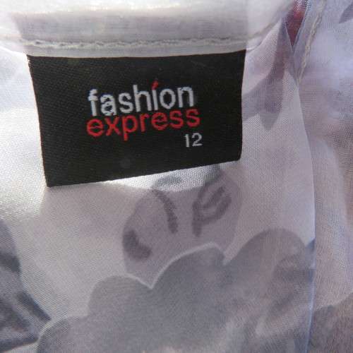 Sweet silver grey sheer polyester summer top with darker grey flowers. Size 36/12 by FASHION EXPRESS