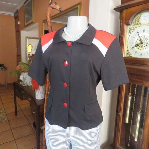 Cute black/red short sleeve button downtop with 2 dummy pockets.size 38/14 by `BOUCHARA As new.