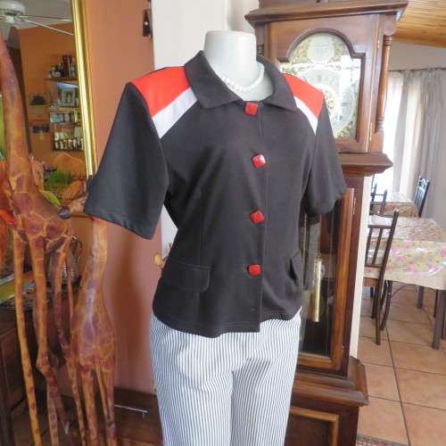 Cute black/red short sleeve button downtop with 2 dummy pockets.size 38/14 by `BOUCHARA As new.