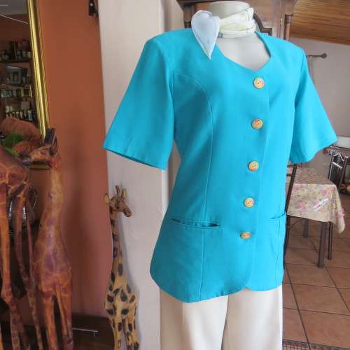 Elegant tailored turquoise fully lined short sleeve jacket. By KILDARE in size 36/12. As new.