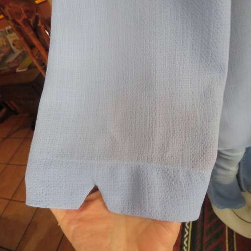 Smart skyblue size 46/22 button down top with elbow length sleeves. Open collar by WHISPER. As new.