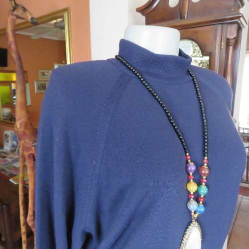 Soft and warm navy long sleeve acrylic knit sweather size 42/18. With raglan sleeves. As new.