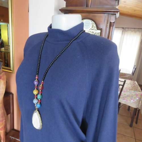 Soft and warm navy long sleeve acrylic knit sweather size 42/18. With raglan sleeves. As new.