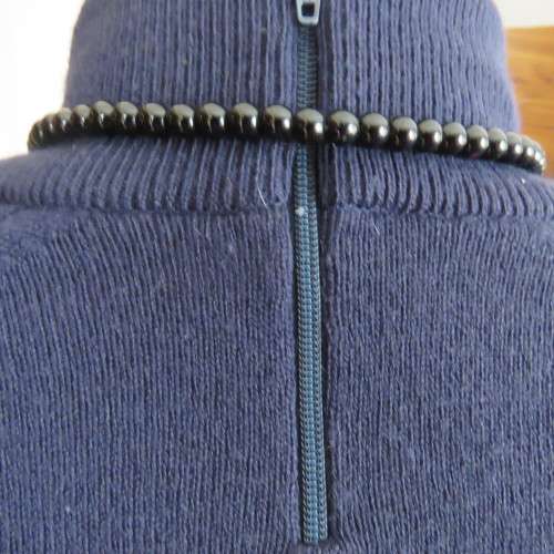 Soft and warm navy long sleeve acrylic knit sweather size 42/18. With raglan sleeves. As new.