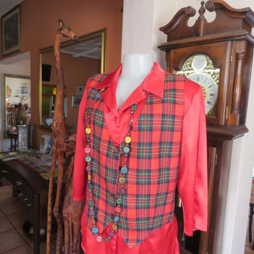 Fully lined tartan check waistcoat in red, green and yellow size 38/14. V neckline. As new.
