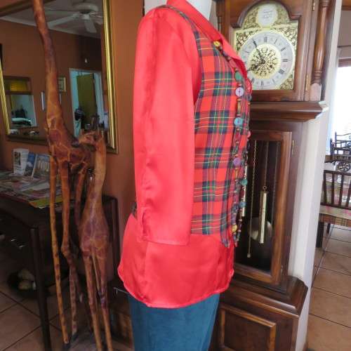 Fully lined tartan check waistcoat in red, green and yellow size 38/14. V neckline. As new.