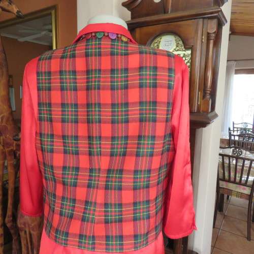 Fully lined tartan check waistcoat in red, green and yellow size 38/14. V neckline. As new.