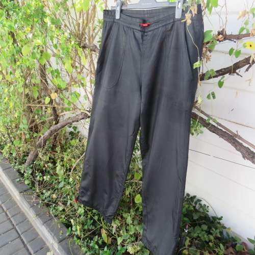 Men`s black CAVENLINE SPORTS pants. In 100% polyester fabric. Fully lined size Large. As new.