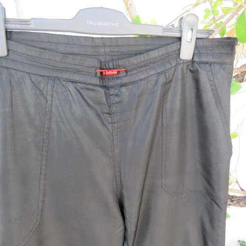 Men`s black CAVENLINE SPORTS pants. In 100% polyester fabric. Fully lined size Large. As new.