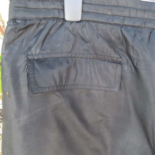 Men`s black CAVENLINE SPORTS pants. In 100% polyester fabric. Fully lined size Large. As new.