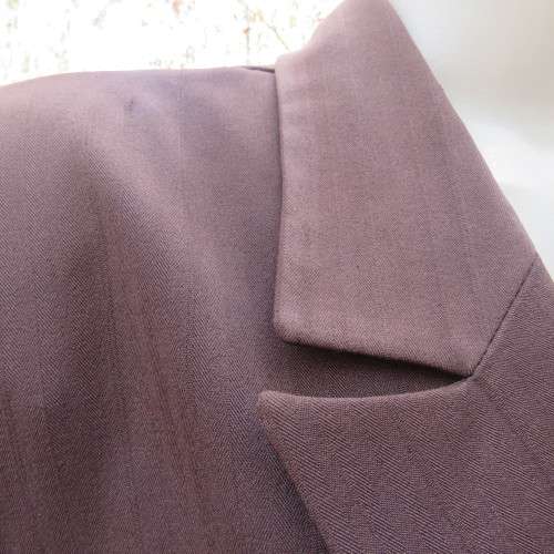 Smart and easy to wear dark brown 2 piece pant suit in poly stretch. Size 48/24 by DONNA CLAIRE