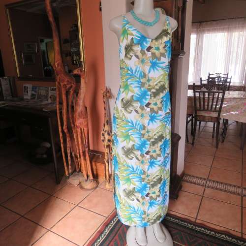 Real summer strappy dress in Fab blue and green floral print by TRUWORTHS in size 38/14. As new.