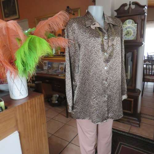 Animal print smart silky polyester long sleeve top in gold and brown colours. Size 40/16. As new.