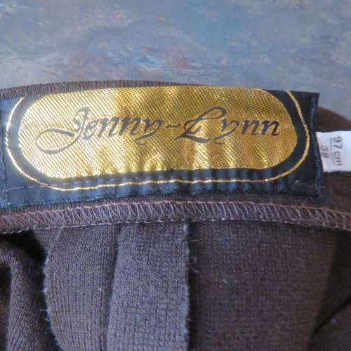 Elegant 80`s choc. brown paneled skirt in jersey size 32 by JENNY- LYNN.Calf length. As new