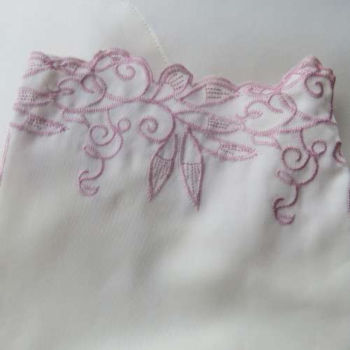 Rich cream long sleeve pyjama top with dainty pink embroidery. Size 32/8 by Foshini.New cond.