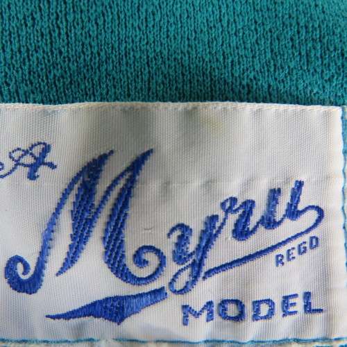 Vintage dress in empire style size 40/16 by MYRU MODELS. Jade colour with silver embroidery.