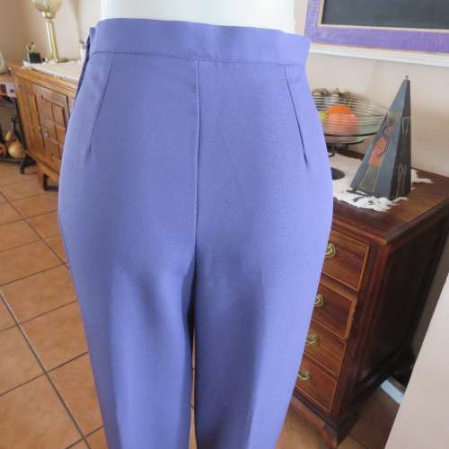 Fabulous high waist eggplant colour pants in size 34/10 by RITE DRESS. Zip at side. New condition.