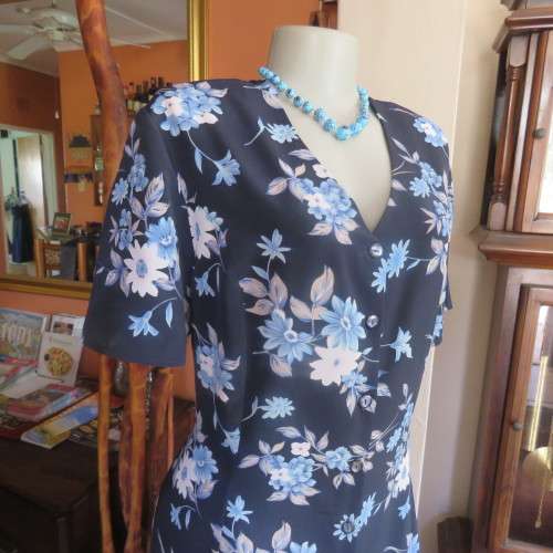Princess style button down dress in navy with light blue posies. Size 44/20 by WOOLWORTHS from 80's