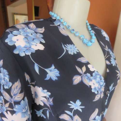 Princess style button down dress in navy with light blue posies. Size 44/20 by WOOLWORTHS from 80's