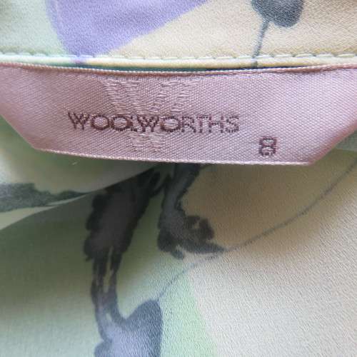 Beautiful colour blocked button down top in soft shades of green,lilac and yellow. Size 32/8/ As new