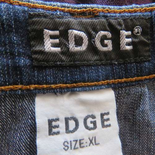 Seriously sexy short denim skirt by EDGE in size 36/12. In stretch polycotton. Zip and 2 pockets.