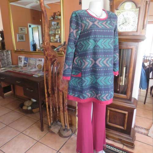 Ethnic look slip over long top in navy,jade and crimson colours, Size 36 to 38. New condition.