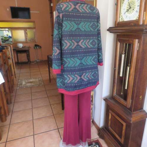 Ethnic look slip over long top in navy,jade and crimson colours, Size 36 to 38. New condition.